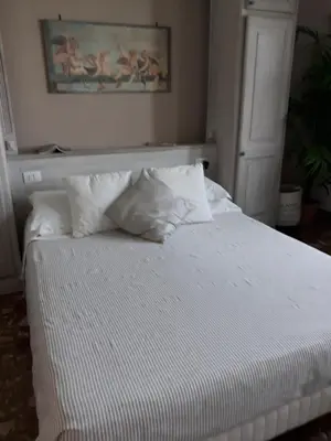 Letto o letti in una camera di Casa Sulla Laguna