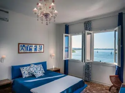 Letto o letti in una camera di Casa Sulla Laguna