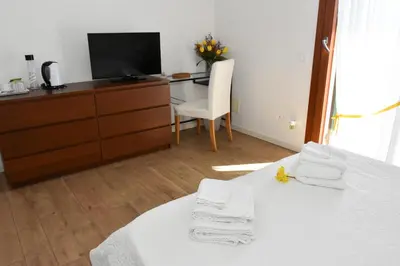 Letto o letti in una camera di B&B Ca' Rina