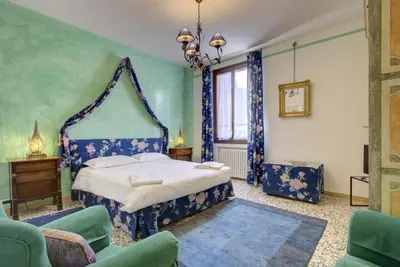 Letto o letti in una camera di BAROCCO-Veneziano