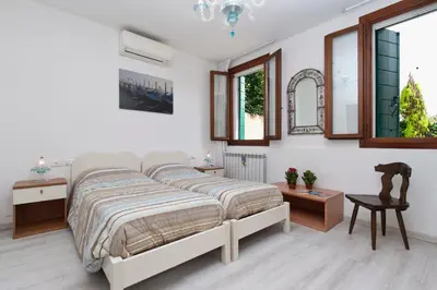 Letto o letti in una camera di Ca' Del Pomo Grana'