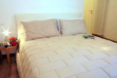 Letto o letti in una camera di Sweet Home