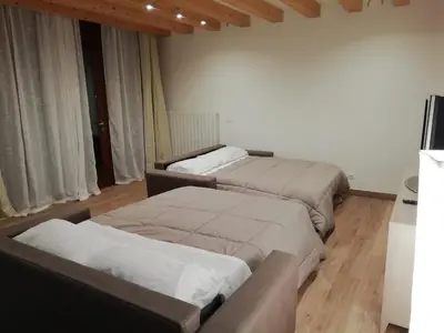 Letto o letti in una camera di Calle Michelangelo Apartments