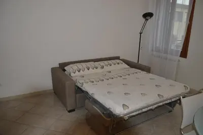 Letto o letti in una camera di Calle Michelangelo Apartments