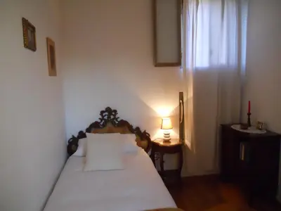 Letto o letti in una camera di Casa MIA