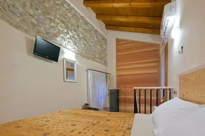 Letto o letti in una camera di Le Zitelle di Ron
