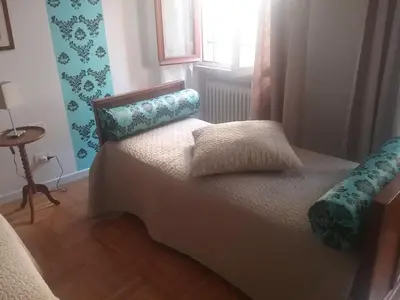 Letto o letti in una camera di B&B Barberia