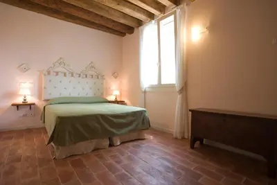 Letto o letti in una camera di Villa Ghislanzoni