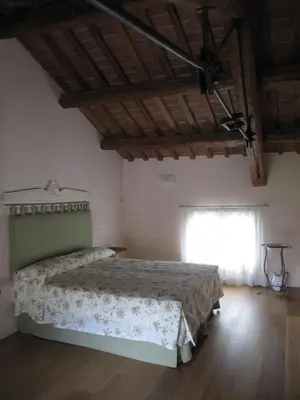 Letto o letti in una camera di Villa Ghislanzoni