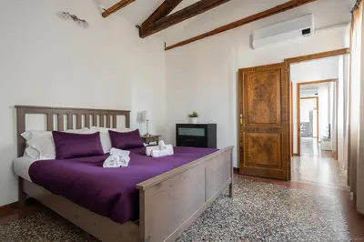 Letto o letti in una camera di Ca' Giorgia Venice Apartment with Balcony