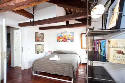 Letto o letti in una camera di Di Franco Super Attico