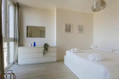 Letto o letti in una camera di Yourbanflat Eremitani