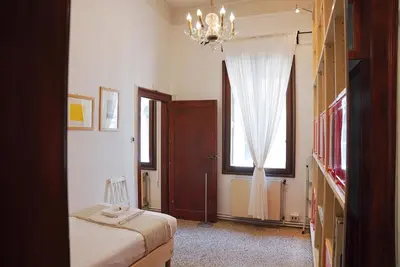 Letto o letti in una camera di Ca' Alle Gondolette by Sarlux