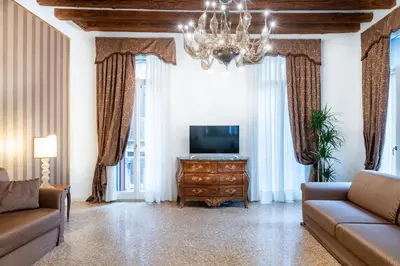 TV o dispositivi per l'intrattenimento presso San Teodoro Palace - Luxury Apartments