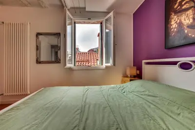Letto o letti in una camera di Ca' d'Oro Design by Wonderful Italy