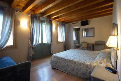 Letto o letti in una camera di Hotel Asolo