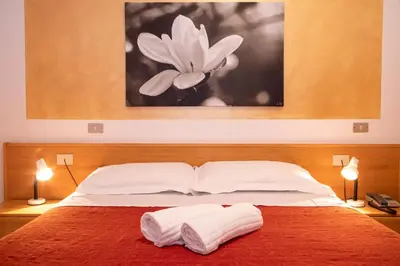 Letto o letti in una camera di Hotel Nazionale