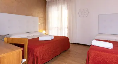 Letto o letti in una camera di Hotel Nazionale