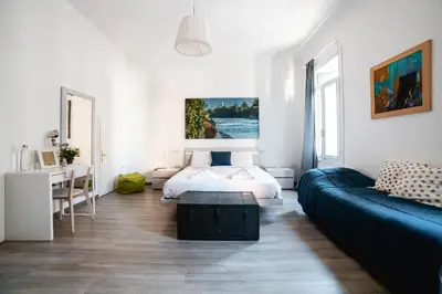 Letto o letti in una camera di Ca' Garibaldi Rooms