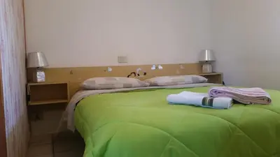 Letto o letti in una camera di Eureka Azienda Agrituristica