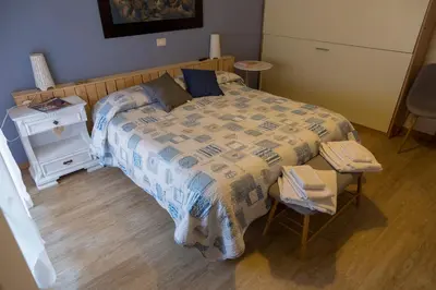 Letto o letti in una camera di Albergo Felice