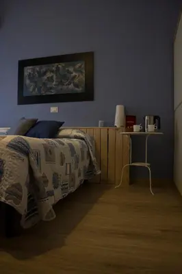 Letto o letti in una camera di Albergo Felice
