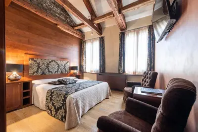 Letto o letti in una camera di Abbazia De Luxe