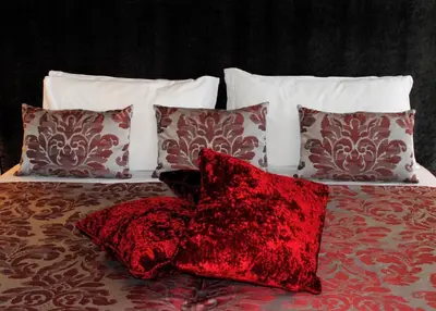 Letto o letti in una camera di Palazzo del Giglio