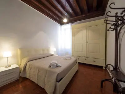 Letto o letti in una camera di San Marco Schiavoni apartments