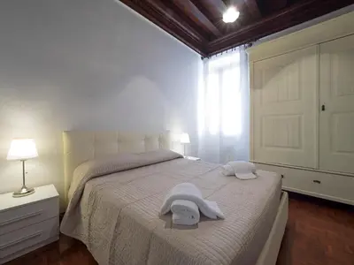 Letto o letti in una camera di San Marco Schiavoni apartments