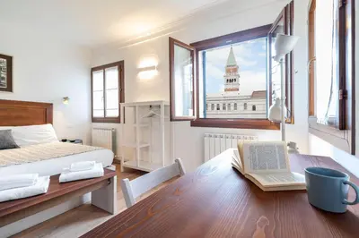 Letto o letti in una camera di San Marco Schiavoni apartments