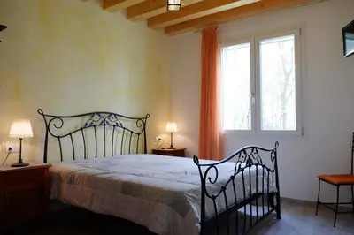Letto o letti in una camera di La casa nel bosco