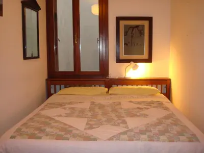 Letto o letti in una camera di Cristina House