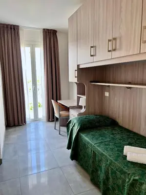 Letto o letti in una camera di Hotel Terramare