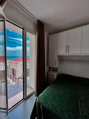 Letto o letti in una camera di Hotel Terramare