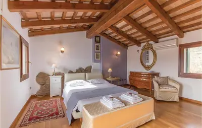 Letto o letti in una camera di Casa Bellavista