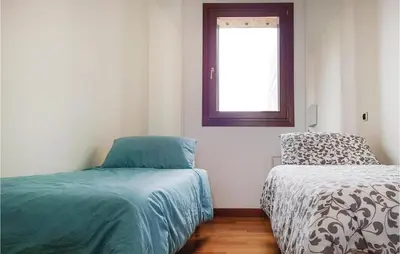 Letto o letti in una camera di Casa Bellavista