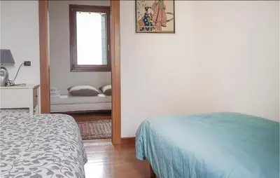 Letto o letti in una camera di Casa Bellavista