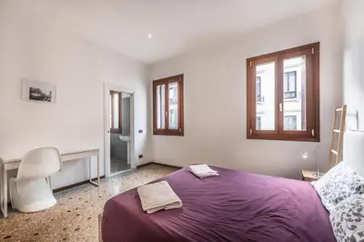 Letto o letti in una camera di Ca' d'Oro suite