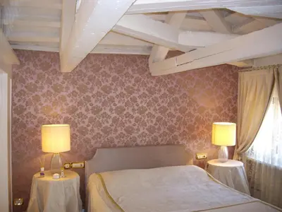 Letto o letti in una camera di WellVenice Fenice