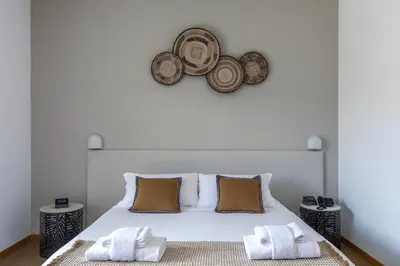 Letto o letti in una camera di Harvey Suites Hotel & Residence