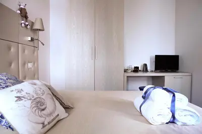 Letto o letti in una camera di B&B Al Pozzo di Luce