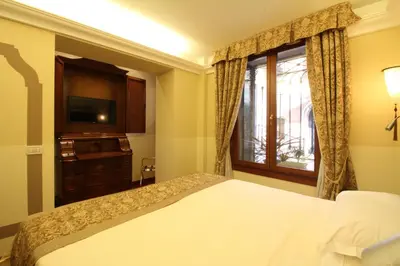 Letto o letti in una camera di Hotel Le Isole