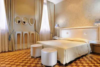 Letto o letti in una camera di Hotel Ai Due Principi