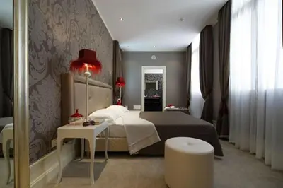 Letto o letti in una camera di Hotel Ai Due Principi