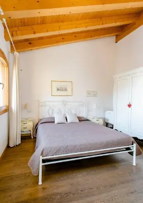 Letto o letti in una camera di Al Piccolo Clarin