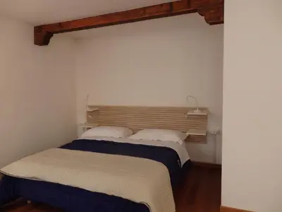 Letto o letti in una camera di Appartamento Goldoni