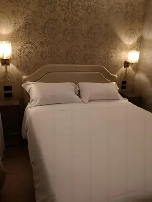 Letto o letti in una camera di Locanda Cavanella