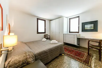 Letto o letti in una camera di Venice Glass apartment