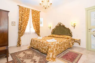 Letto o letti in una camera di Ca' Venezia Loc-09522